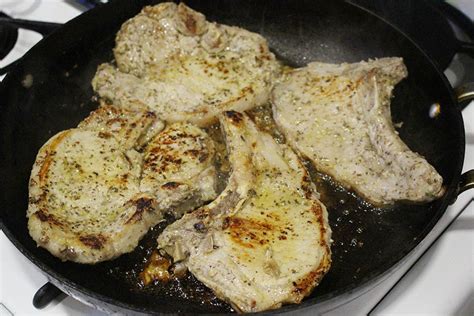 pan-fried-greek-porkchops-savvy-in-the-kitchen image