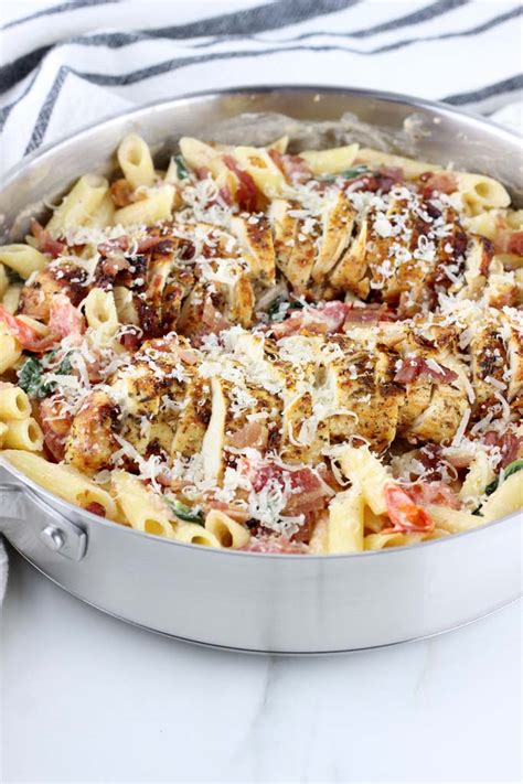 easy-chicken-bacon-pasta-with-spinach-and-tomatoes image