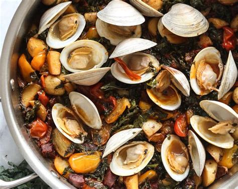 steamed-clams-with-chorizo-tomatoes-and-kale image