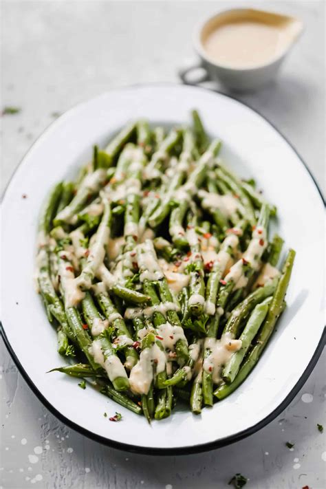 roasted-green-beans-with-spicy-tahini-sauce image