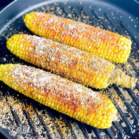 grilled-corn-with-spicy-cajun-butter image