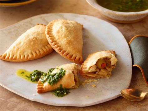 chicken-and-olive-empanadas-with-chimichurri-sauce image