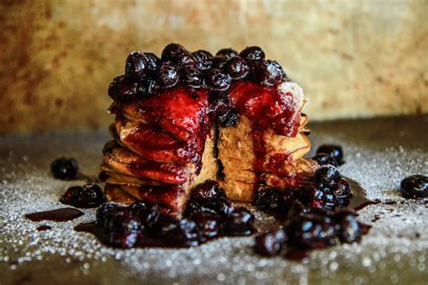 sweet-potato-pancakes-with-spiced-blueberry-sauce image