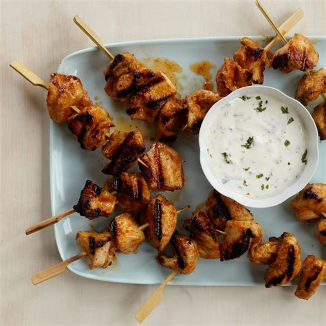 red-curry-chicken-kebabs-with-minty-yogurt-sauce-recipe-red image
