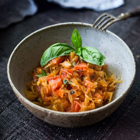 spaghetti-squash-with-tomato-basil-sauce-eatingwell image