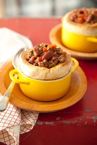 chili-in-a-biscuit-bowl-topped-with-sour-cream-cheese image