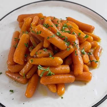 orange-spiced-maple-glazed-carrots-recipe-sidechef image