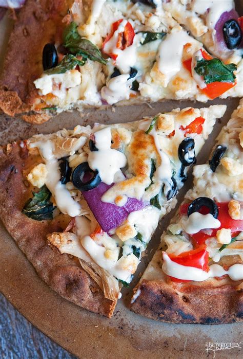 greek-pizza-with-tzatziki-drizzle-the-bewitchin-kitchen image