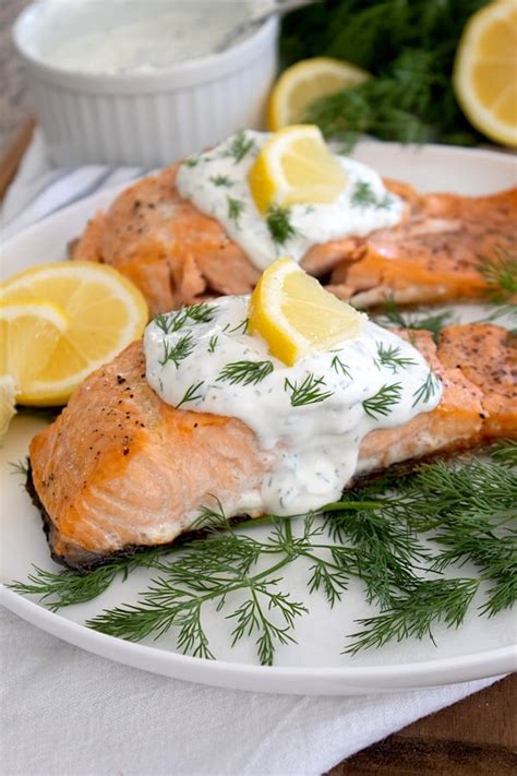 baked-salmon-with-lemon-dill-sauce-laughing-spatula image