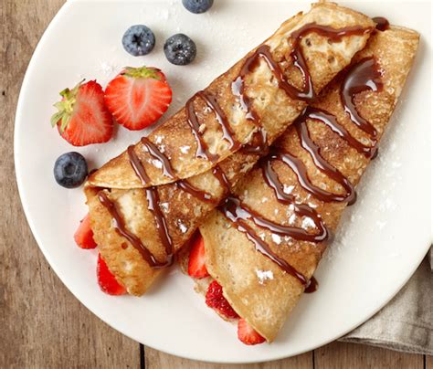 crpes-filled-with-strawberries-and-chocolate-sauce image