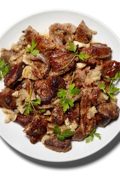braised-lamb-with-anchovies-garlic-and-white-wine image