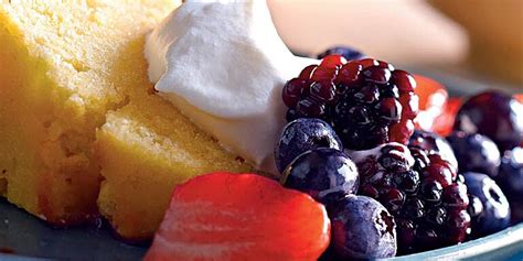 lemon-cornmeal-pound-cake-with-berries-cream image