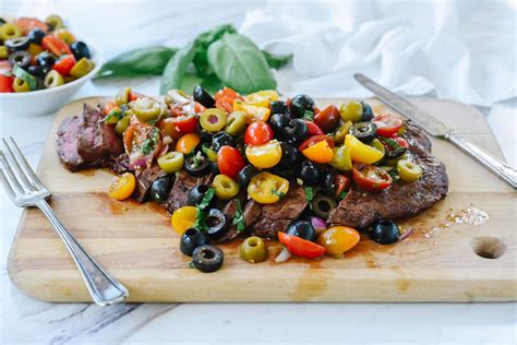 grilled-flank-steak-with-tomato-olive-relish image