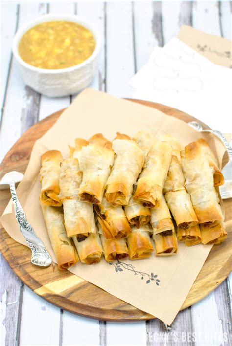mini-chicken-cigars-with-sweet-and-sour-pineapple image
