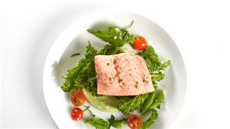 poached-salmon-with-avocado-sauce-recipe-bon-apptit image