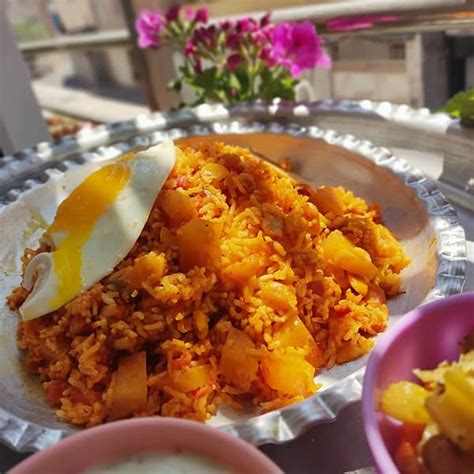 persian-one-pot-tomato-rice-dami-gojeh-farangi image