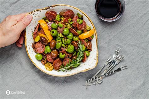 warm-marinated-olives-and-salami-easy-appetizer image