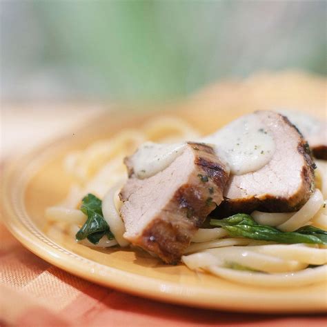 pork-loin-with-creamy-pesto-sauce-recipe-eatingwell image