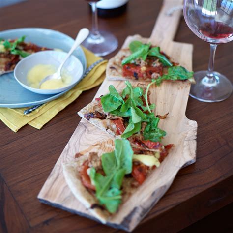 tuna-and-tomato-pizza-with-aioli-recipe-food-and-wine image