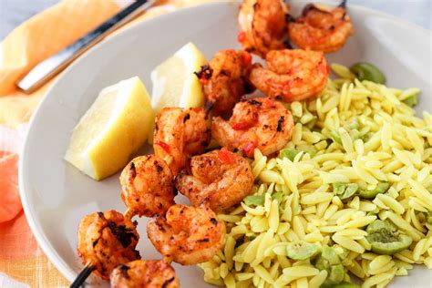 harissa-grilled-shrimp-with-orzo-and-olives image