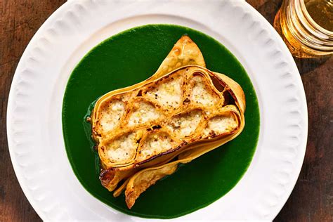 woven-lasagna-with-prosciutto-and-fresh-spinach-sauce image