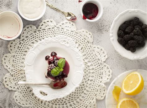 vegan-lemon-panna-cotta-with-blackberry-basil-coulis image