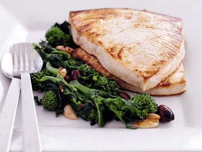 seared-swordfish-with-stewed-sicilian-style-broccoli-rabe image