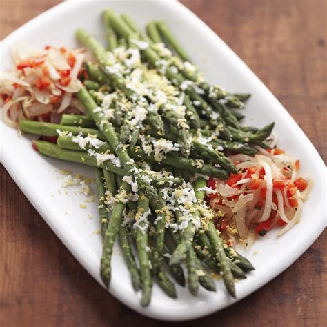 asparagus-with-red-peppers-recipe-eatingwell image
