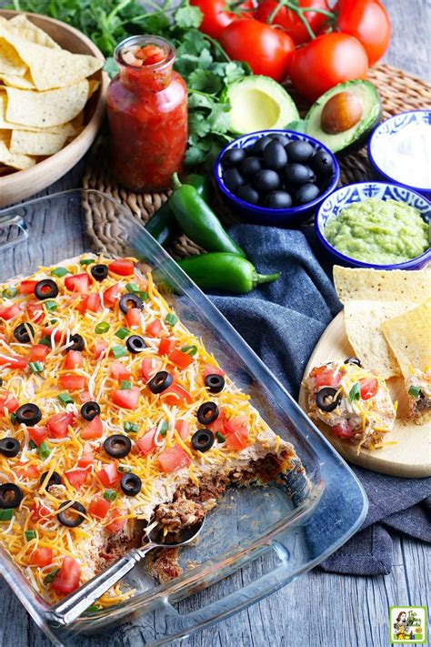 layered-taco-dip-recipe-with-ground-beef-and-cream image