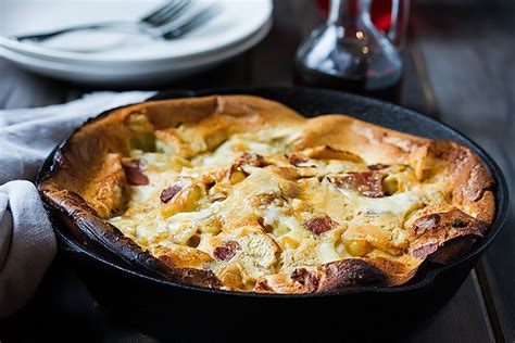 dutch-baby-pancake-with-peach-and-bacon-sweet-and-savory image
