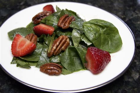 spinach-salad-with-strawberries-and-pecans image