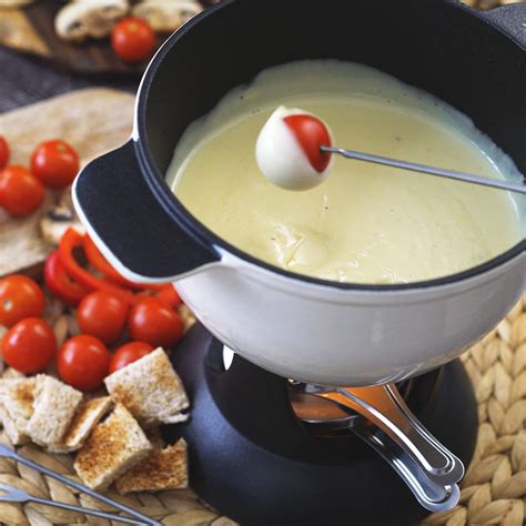 classic-swiss-cheese-fondue-recipe-by-melissa-kelly image