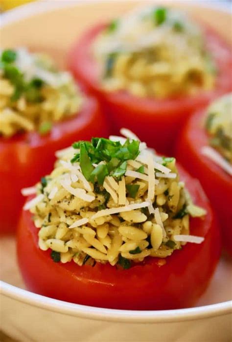 spinach-and-orzo-stuffed-tomatoes image