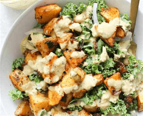 spicy-potato-kale-bowls-with-mustard-tahini-dressing image