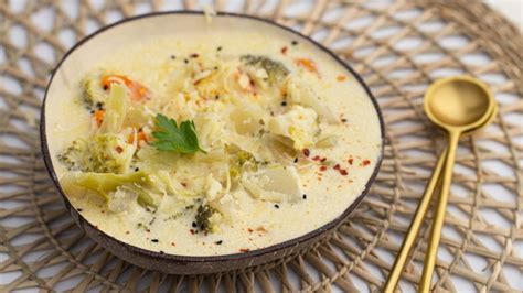 slow-cooker-broccoli-potato-cheese-soup-recipe-mashed image