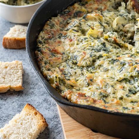hot-spinach-artichoke-dip-recipe-a-table-full-of-joy image