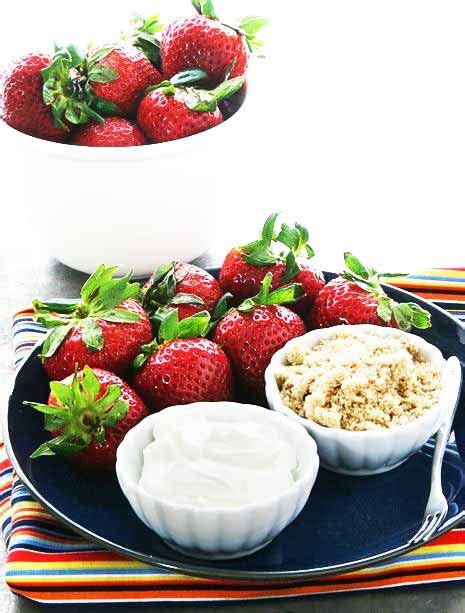 strawberries-dipped-in-sour-cream-and-brown-sugar image