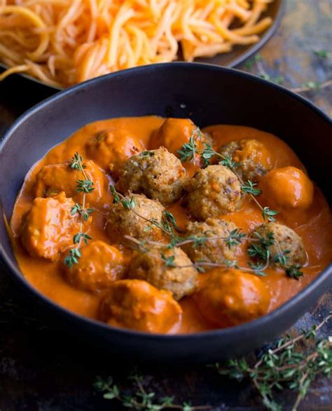 greek-meatballs-with-roasted-red-pepper-sauce image