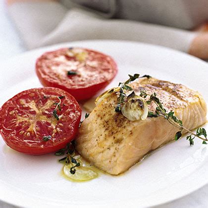 garlicky-broiled-salmon-and-tomatoes-recipe-myrecipes image