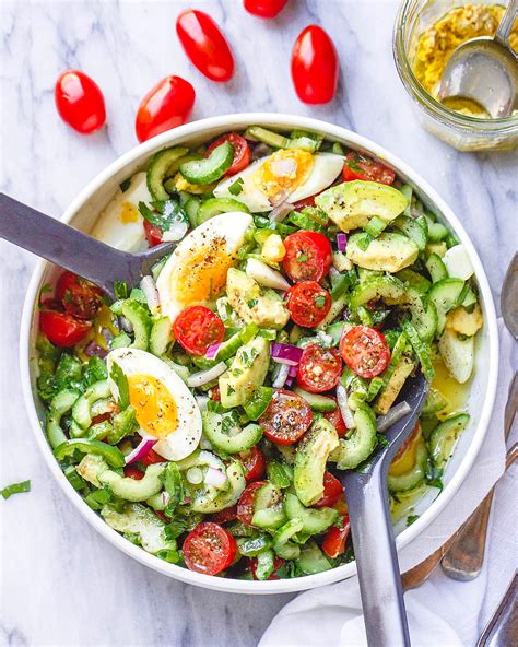 avocado-salad-with-tomato-eggs-and-cucumber image