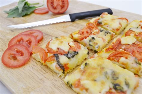 tomato-basil-squares-recipe-easy-pizza-appetizer-rada image