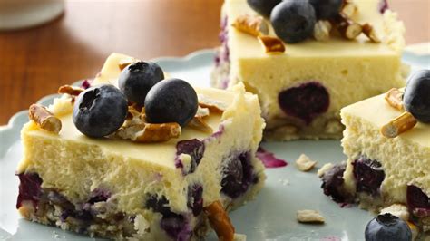 lemon-blueberry-pretzel-cheesecake-squares image