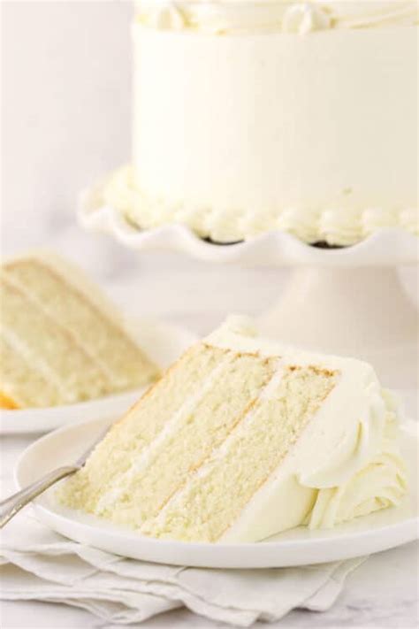 light-and-fluffy-white-cake-with-whipped-frosting image