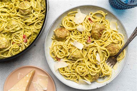 pesto-meatballs-with-spaghetti-recipe-the-spruce-eats image