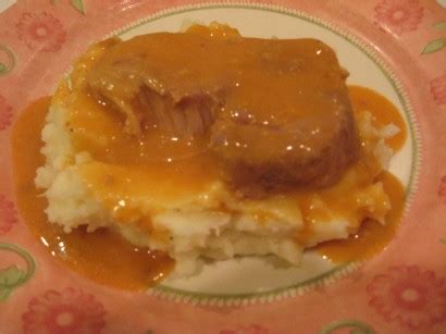 saucy-crockpot-pork-chops-tasty-kitchen image