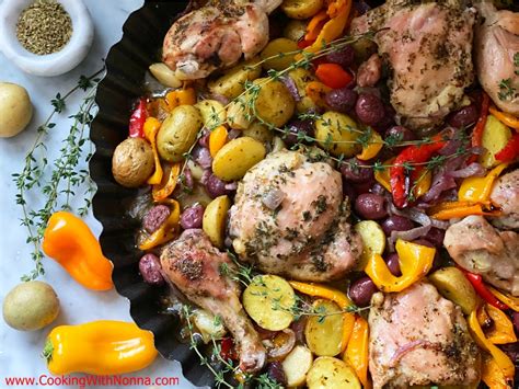 roasted-chicken-with-peppers-potatoes-olives image