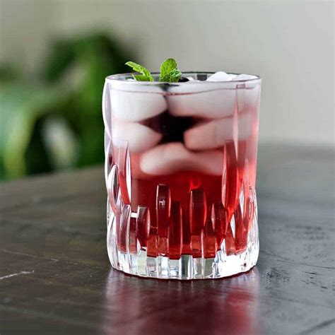black-raspberry-chambord-drink-with-lime-and-tonic image