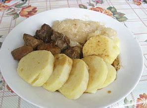 dumplings-with-sauerkraut-and-pork-knedlo image