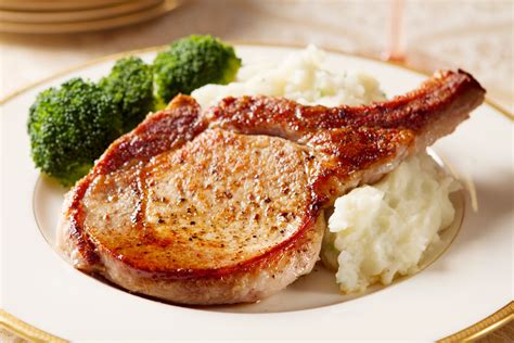 perfect-juicy-pork-chops-recipe-the-spruce image