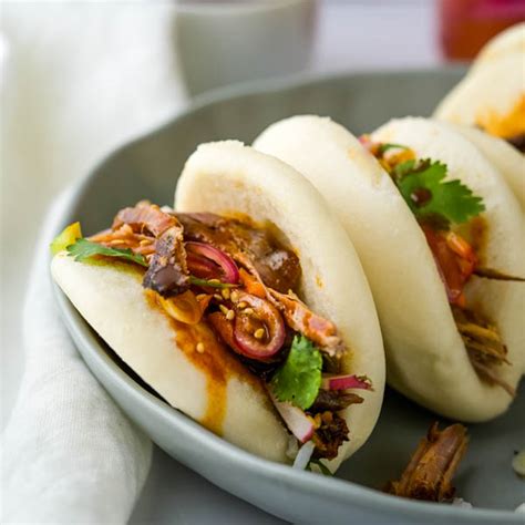 tangy-asian-bbq-pulled-pork-buns-garlic-zest image